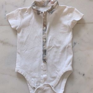 Burberry onesie. Button & clasp closure. 12m